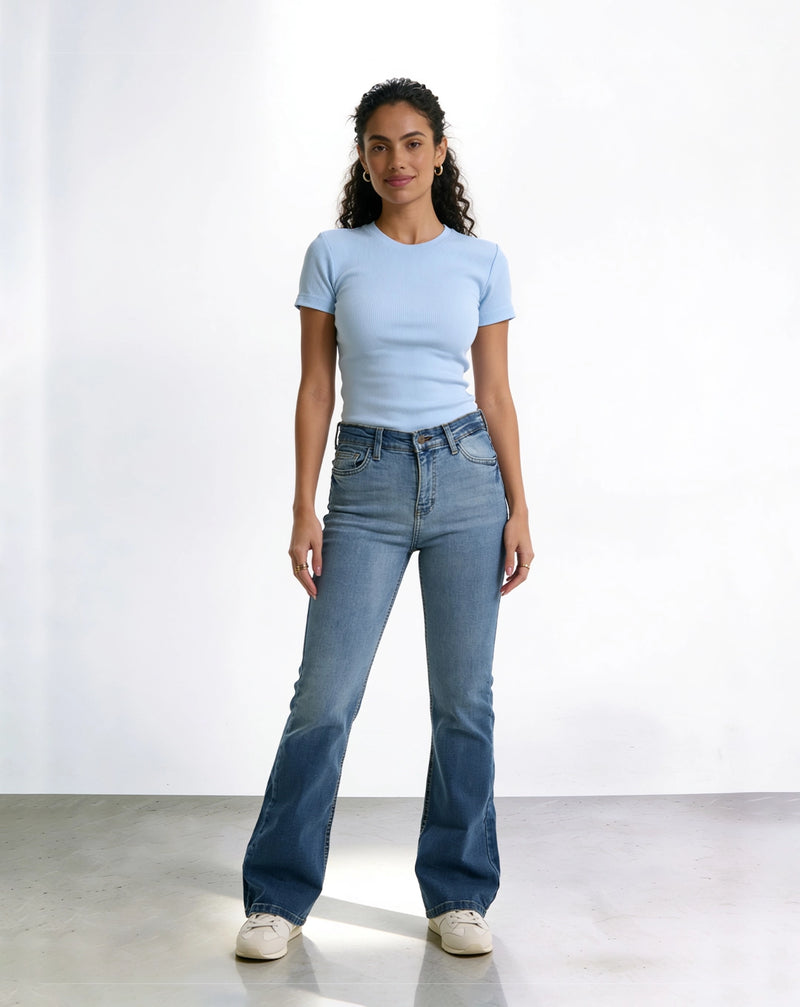High-waisted flared jeans with tiered detailing.