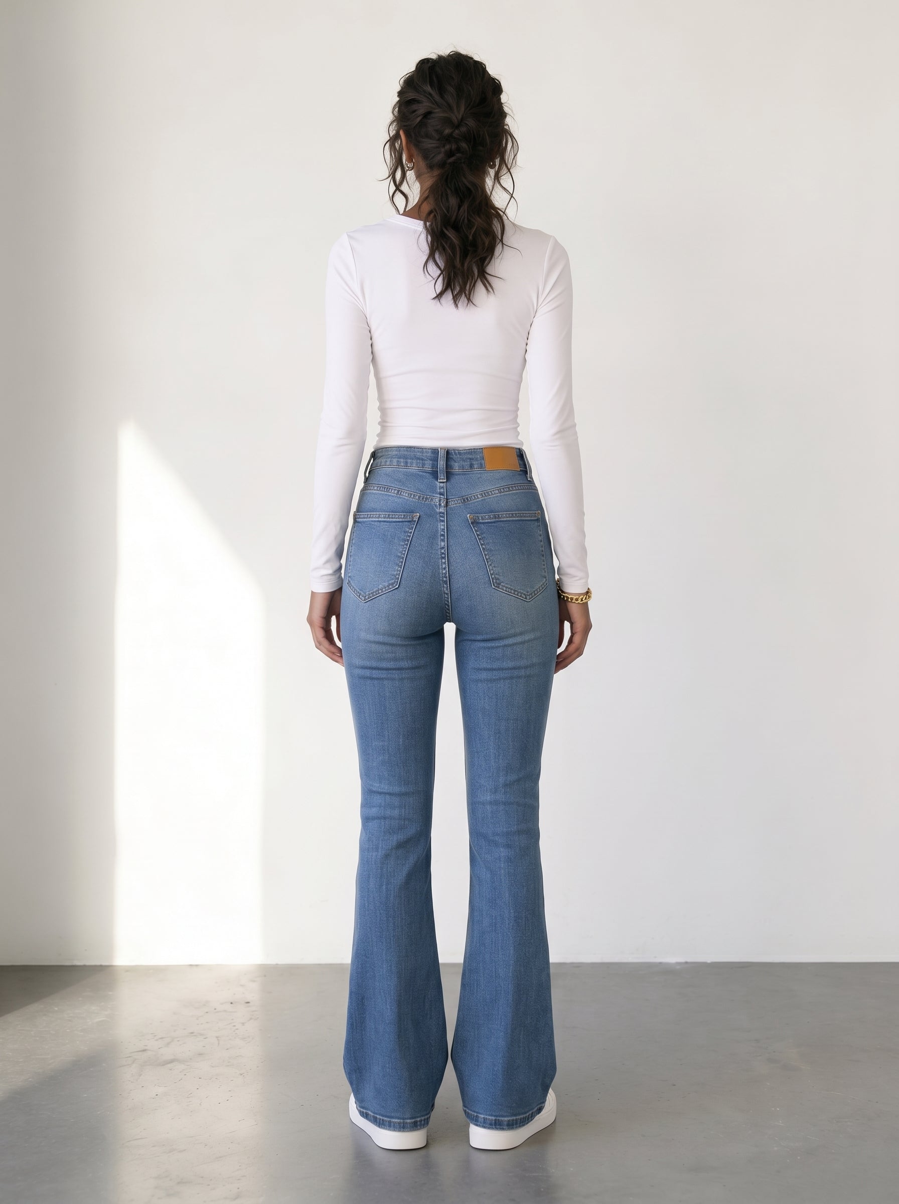 High-waisted flared jeans with ombré detailing