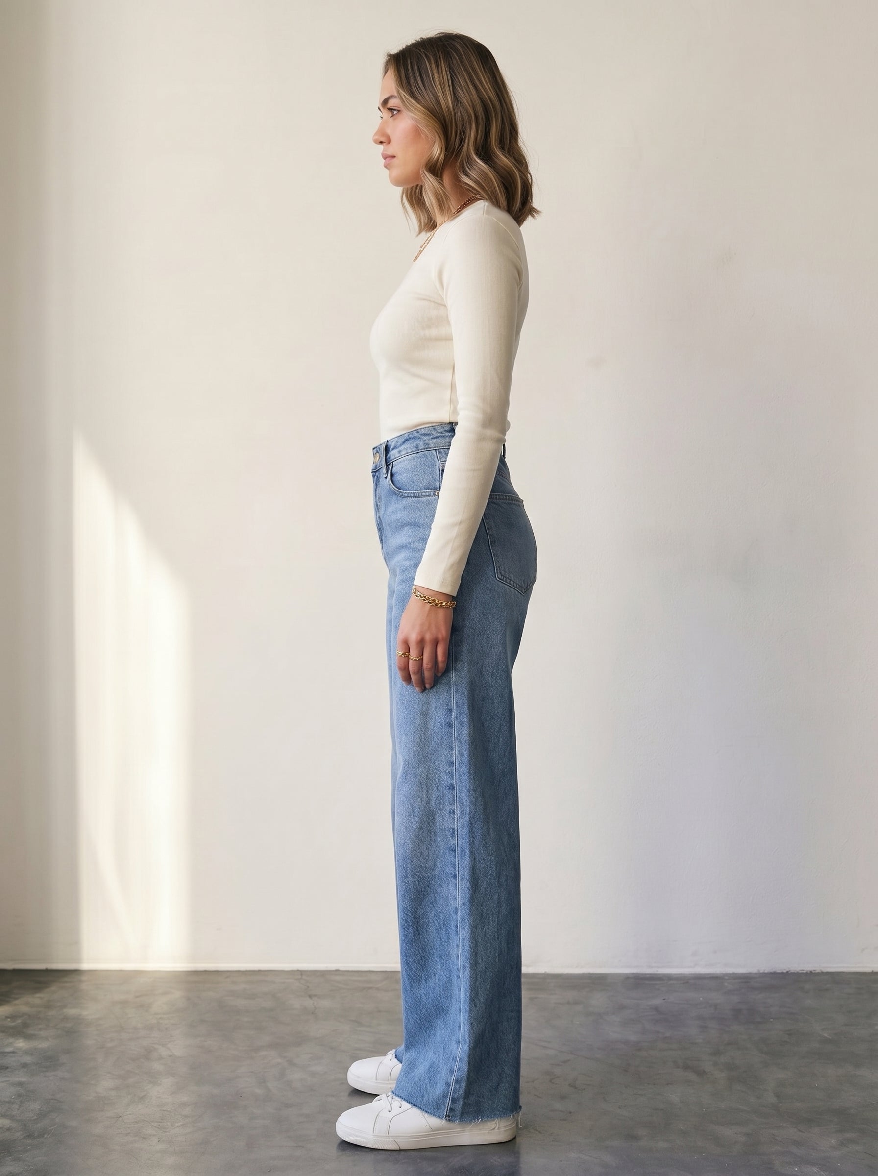 High-waisted, wide-leg jeans with raw hems