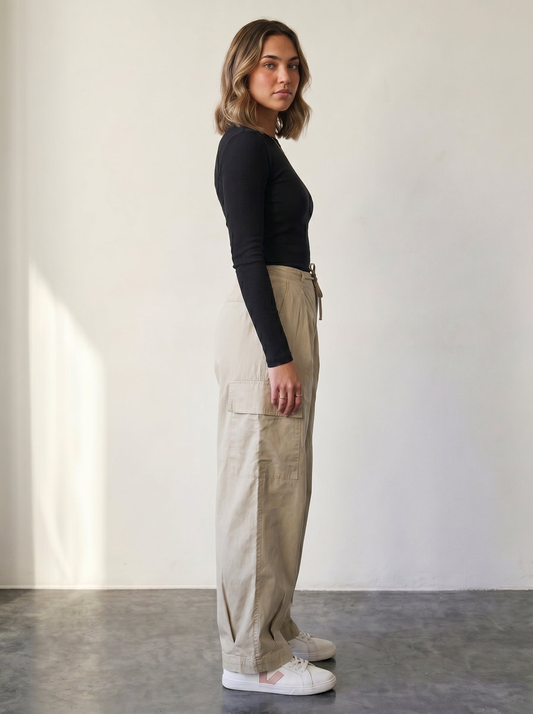 High-waisted beige cargo pants with drawstring