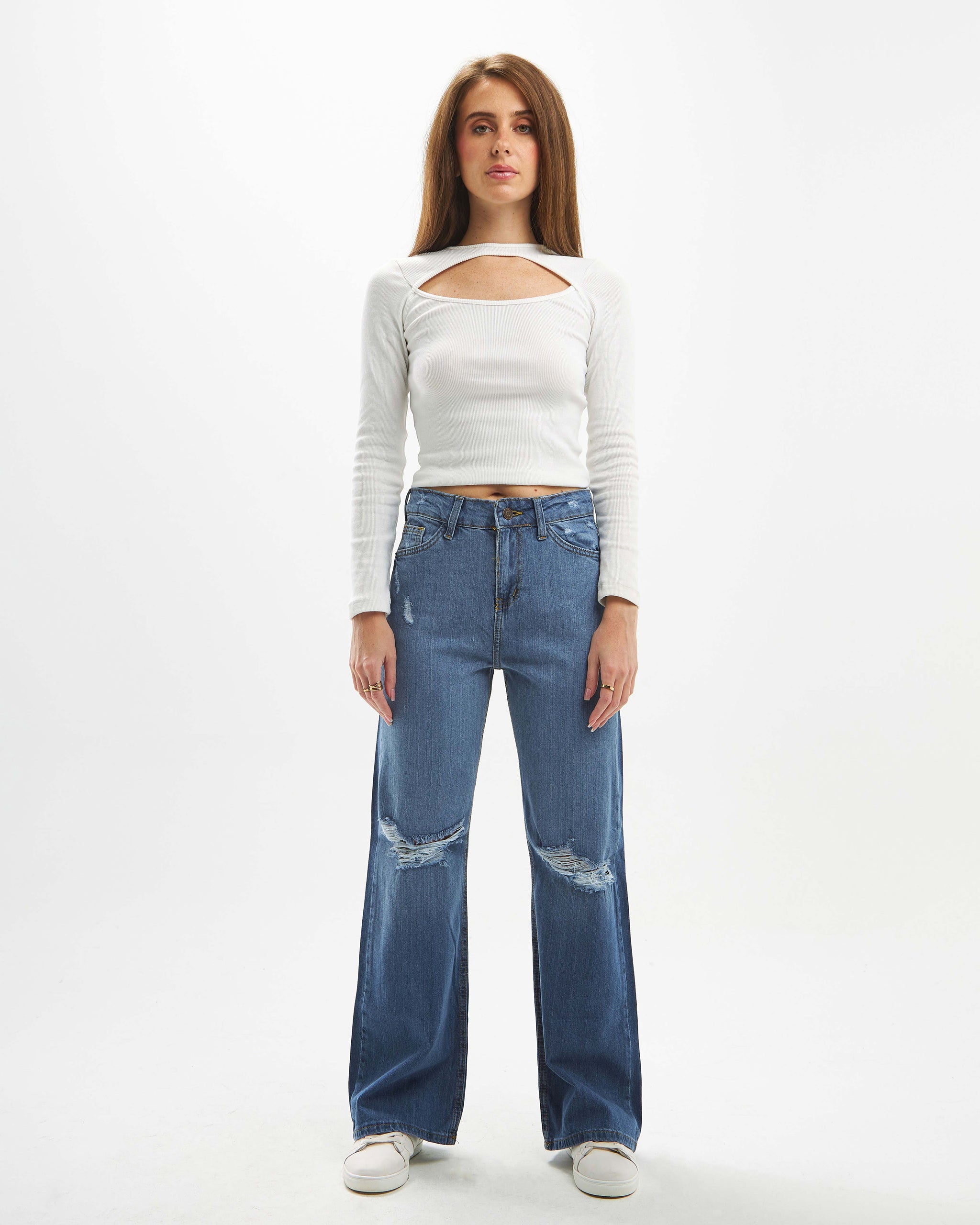 Wide-leg distressed high-waisted jeans.